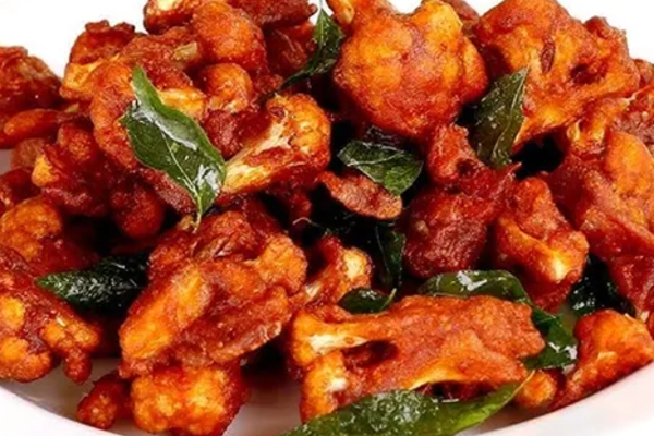 காலிஃபிளவர் பக்கோடா சாப்பிட்ட பெண்ணுக்கு நேர்ந்த விபரீதம்: நடந்தது என்ன?