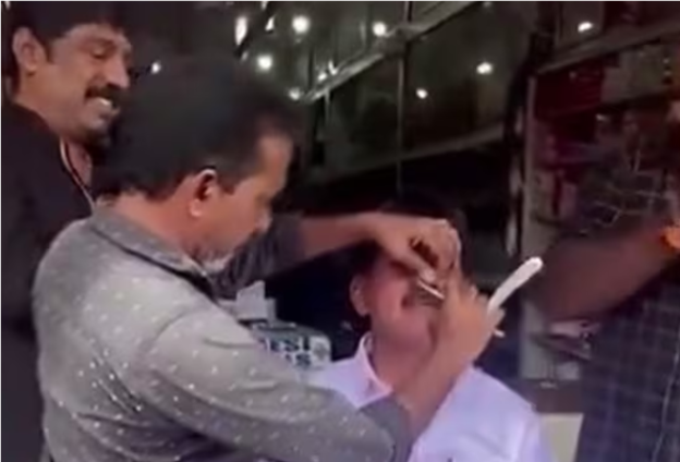 சவால் நிறைவேற்றம்: தேர்தலில் கட்சி தோற்றதால் மீசையை எடுத்த தொண்டர் – கேரளாவில் வைரலாகும் வீடியோ!
